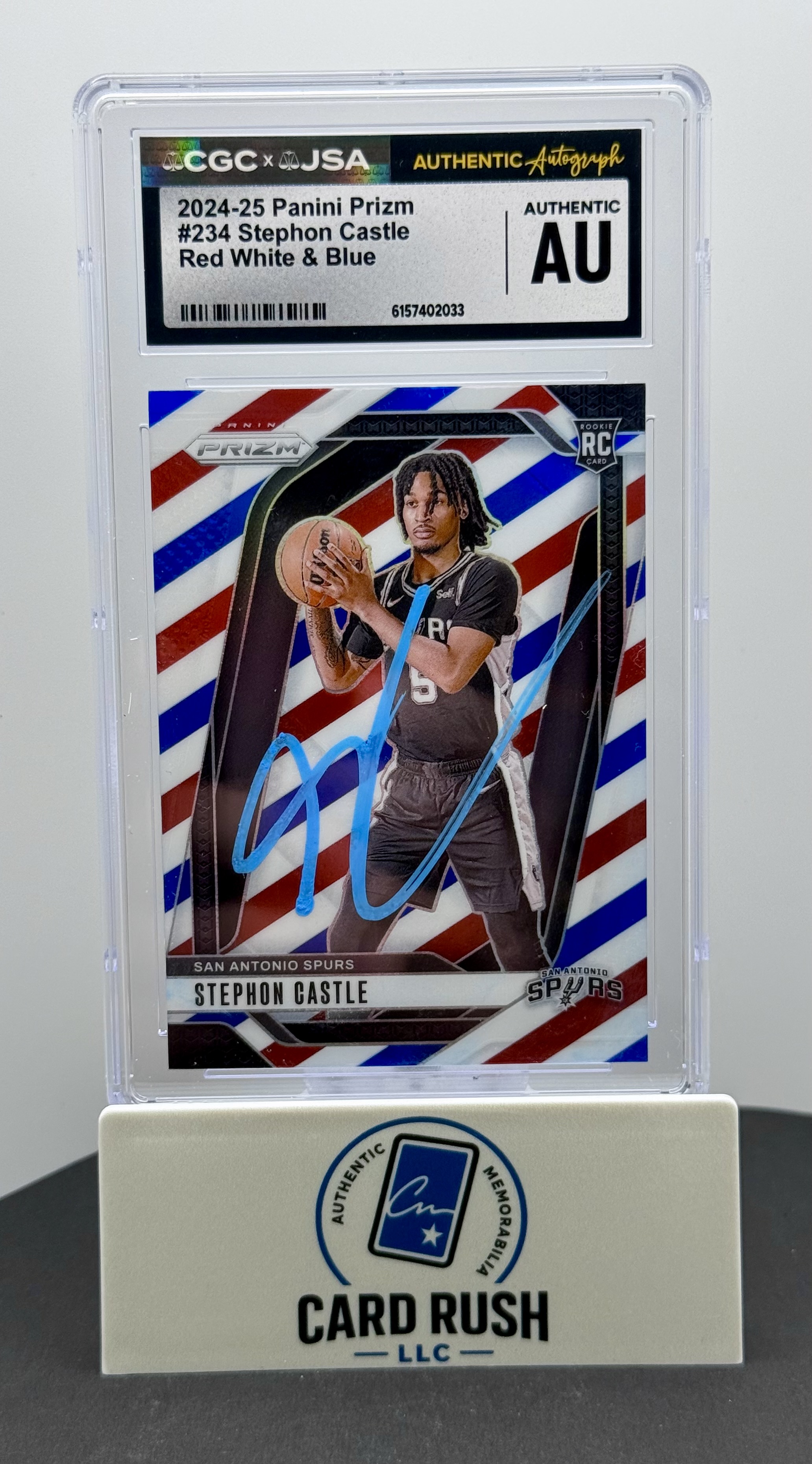 2024-25 Panini Prizm Red White & Blue #234 Stephon Castle RC IP Auto San Antonio Spurs CGC/JSA Authentic Autograph, front