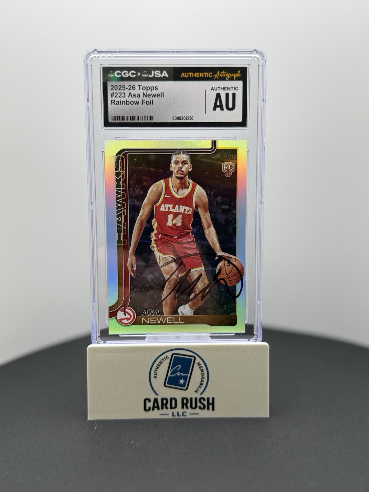 2025-26 Topps Asa Newell Rainbow Foil RC IP Autograph CGC/JSA Authentic, front
