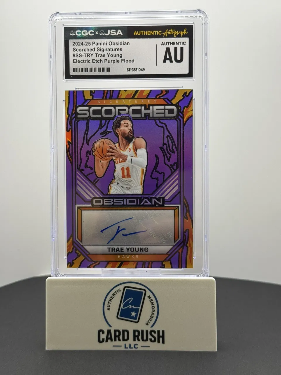 2024-25 Panini Obsidian Trae Young Scorched Signatures Purple Flood Auto 18/25