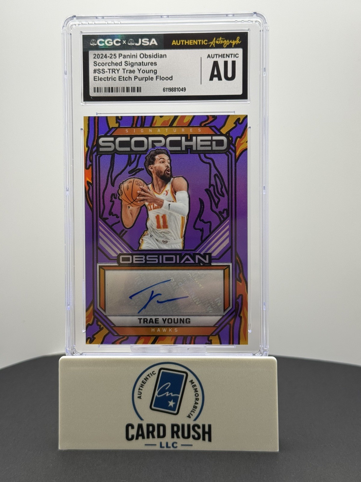 2024-25 Panini Obsidian Trae Young Scorched Signatures Purple Flood Auto 18/25, front