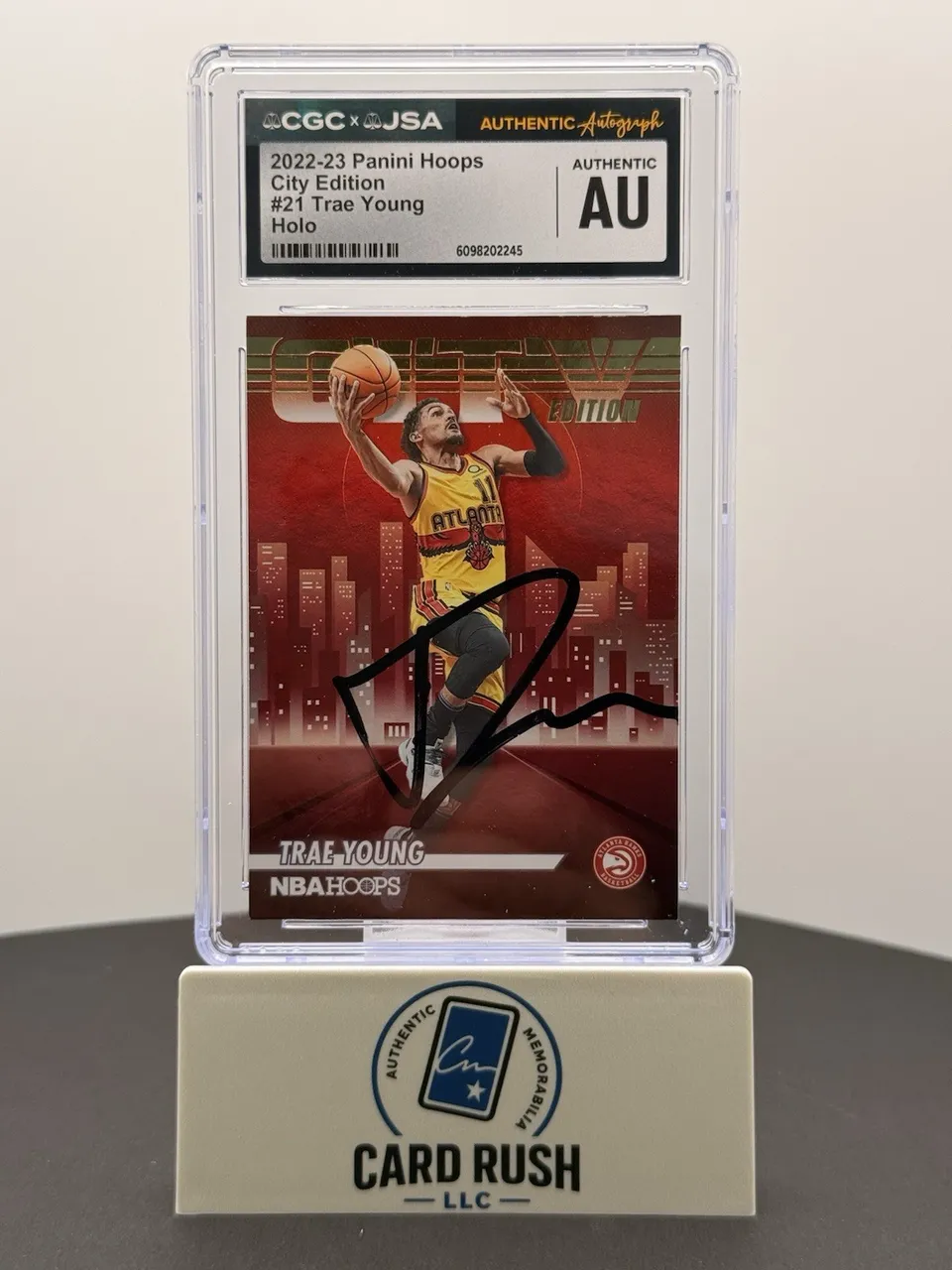 2022-23 Panini Hoops City Edition Trae Young Holo IP Auto CGC/JSA Authentic