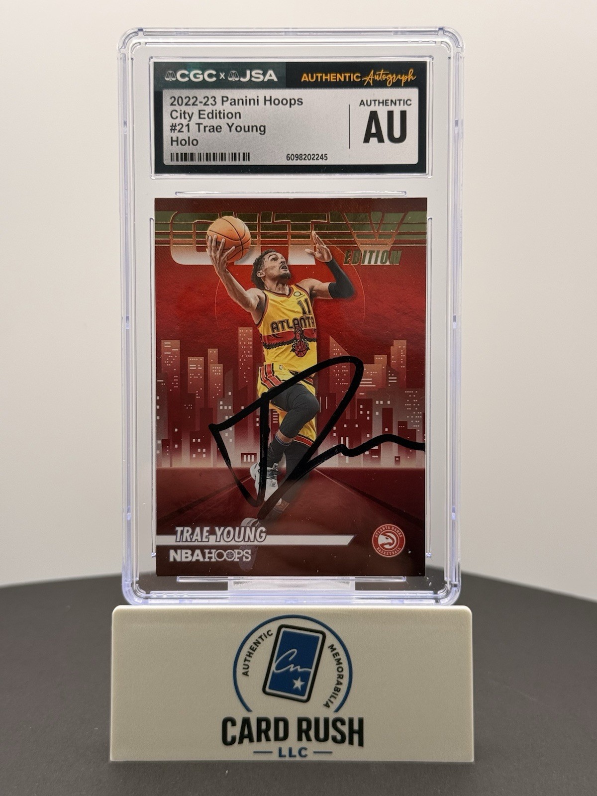 2022-23 Panini Hoops City Edition Trae Young Holo IP Auto CGC/JSA Authentic, front