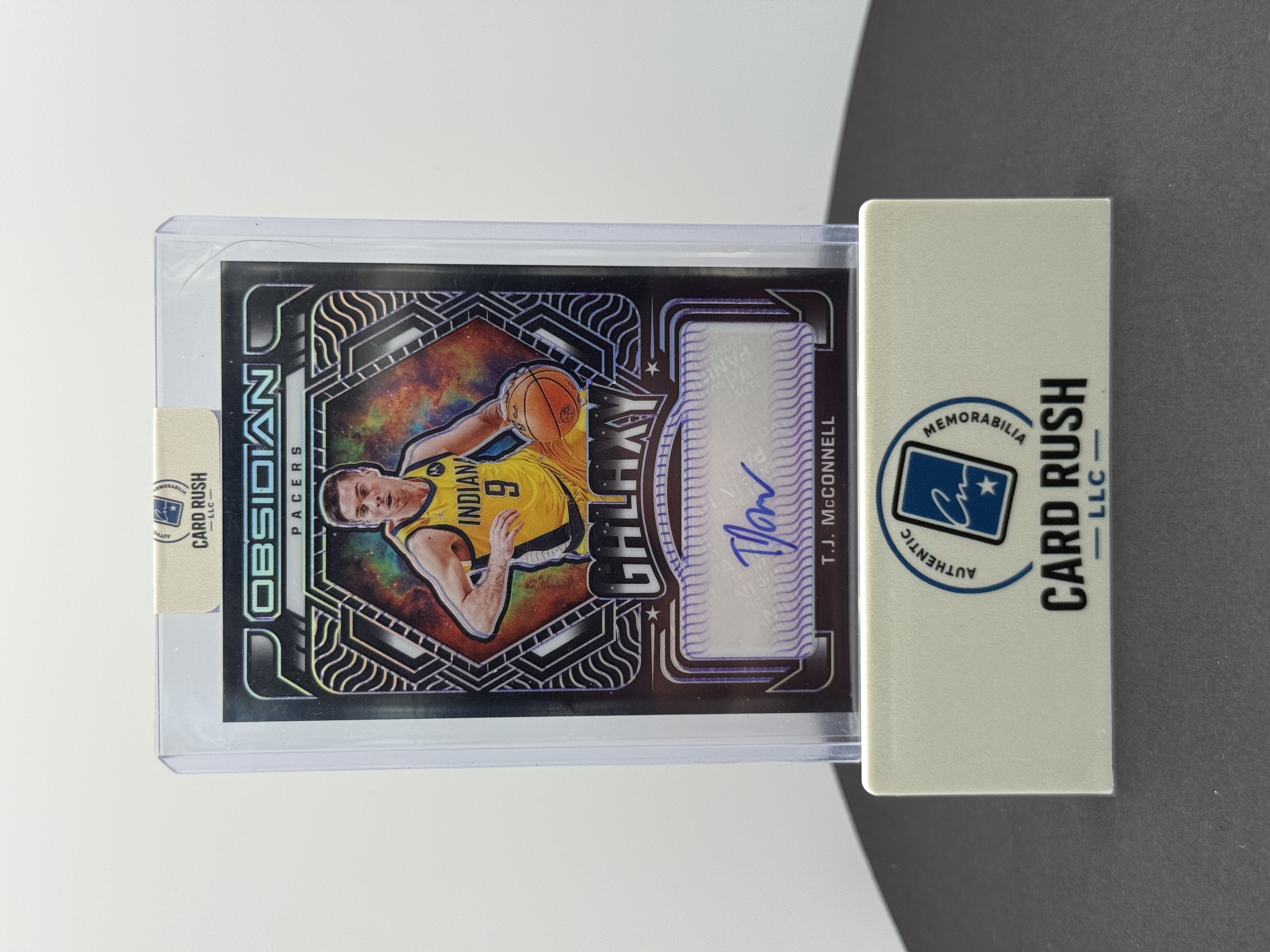 2020-21 Panini Obsidian Galaxy T.J. McConnell Obsidian Autograph Basketball Card, front