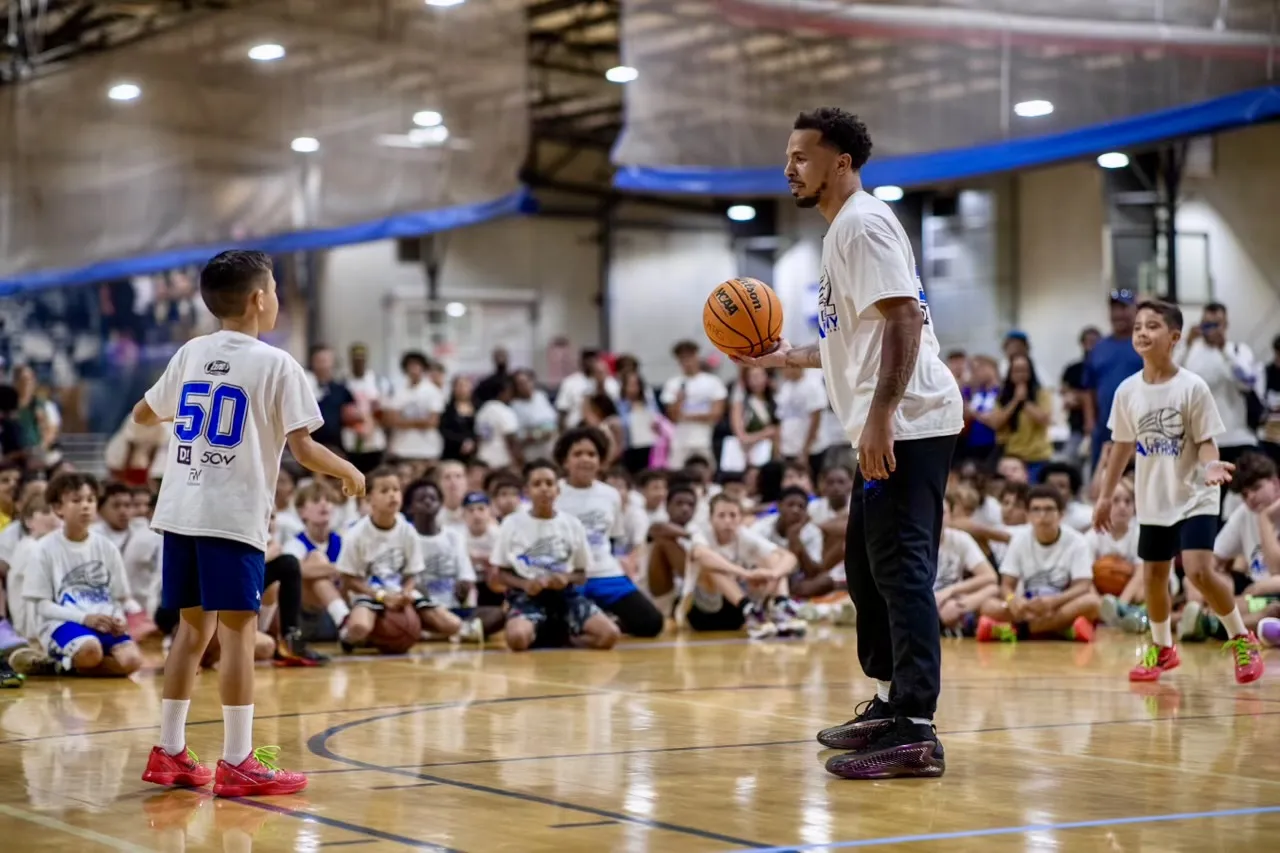 Caeden getting a pass from Cole Anthony, one on one, at his basketball camp